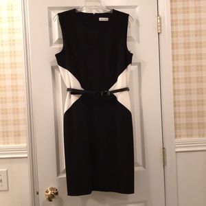 Calvin Klein sleeveless lined dress with belt.